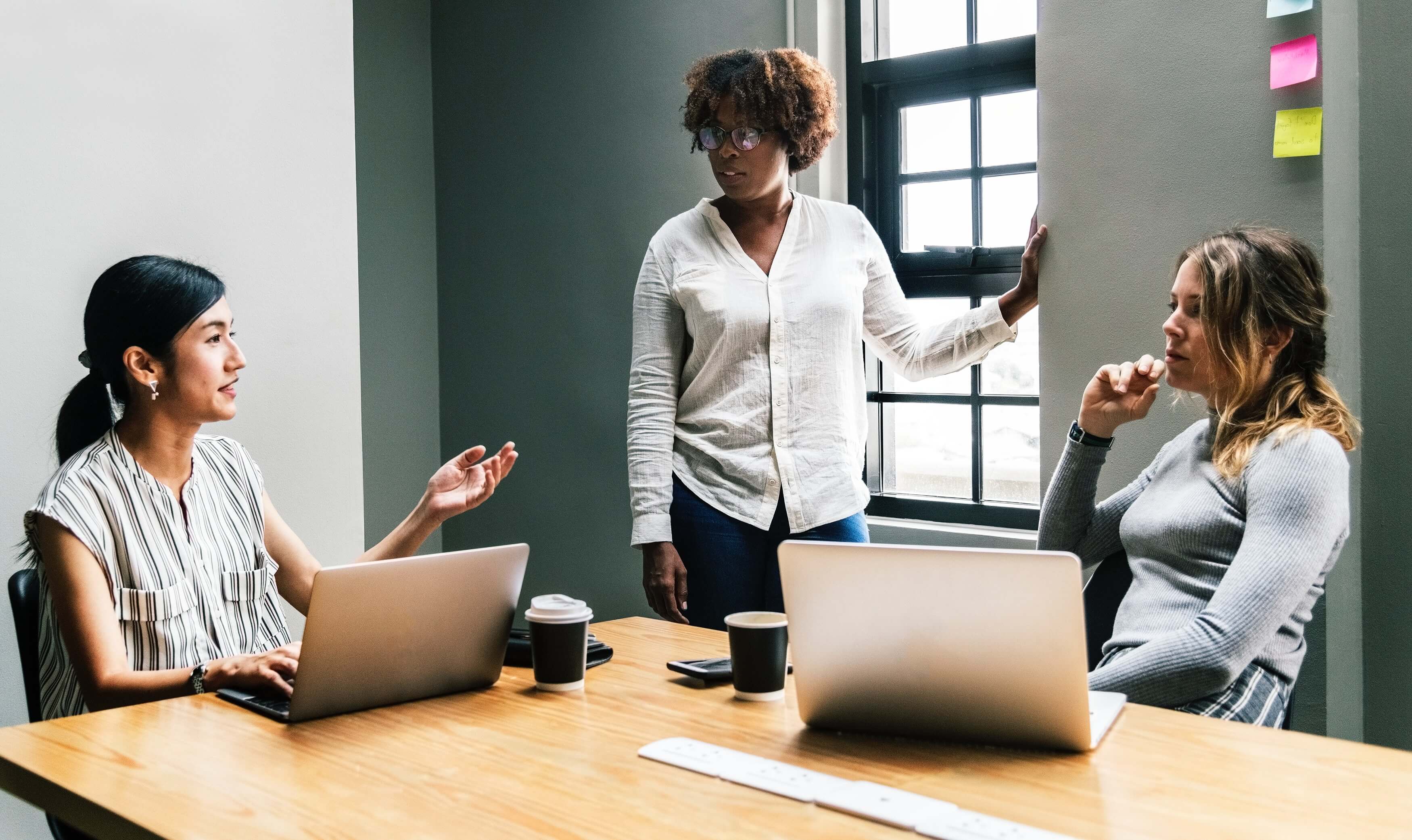 three-women-onboarding-employee