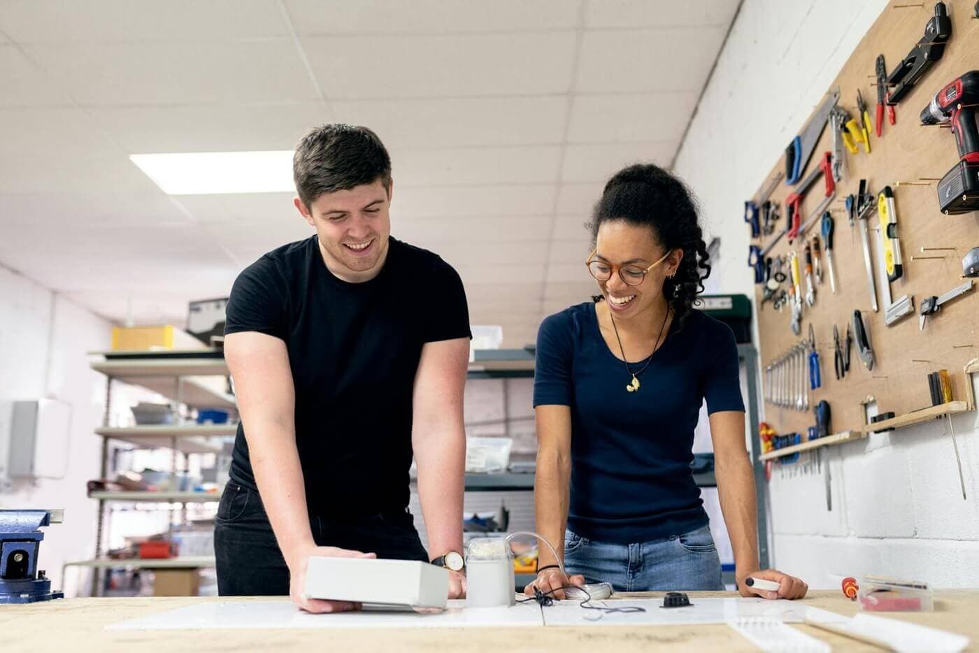 Two colleague learning together in a workshop setting