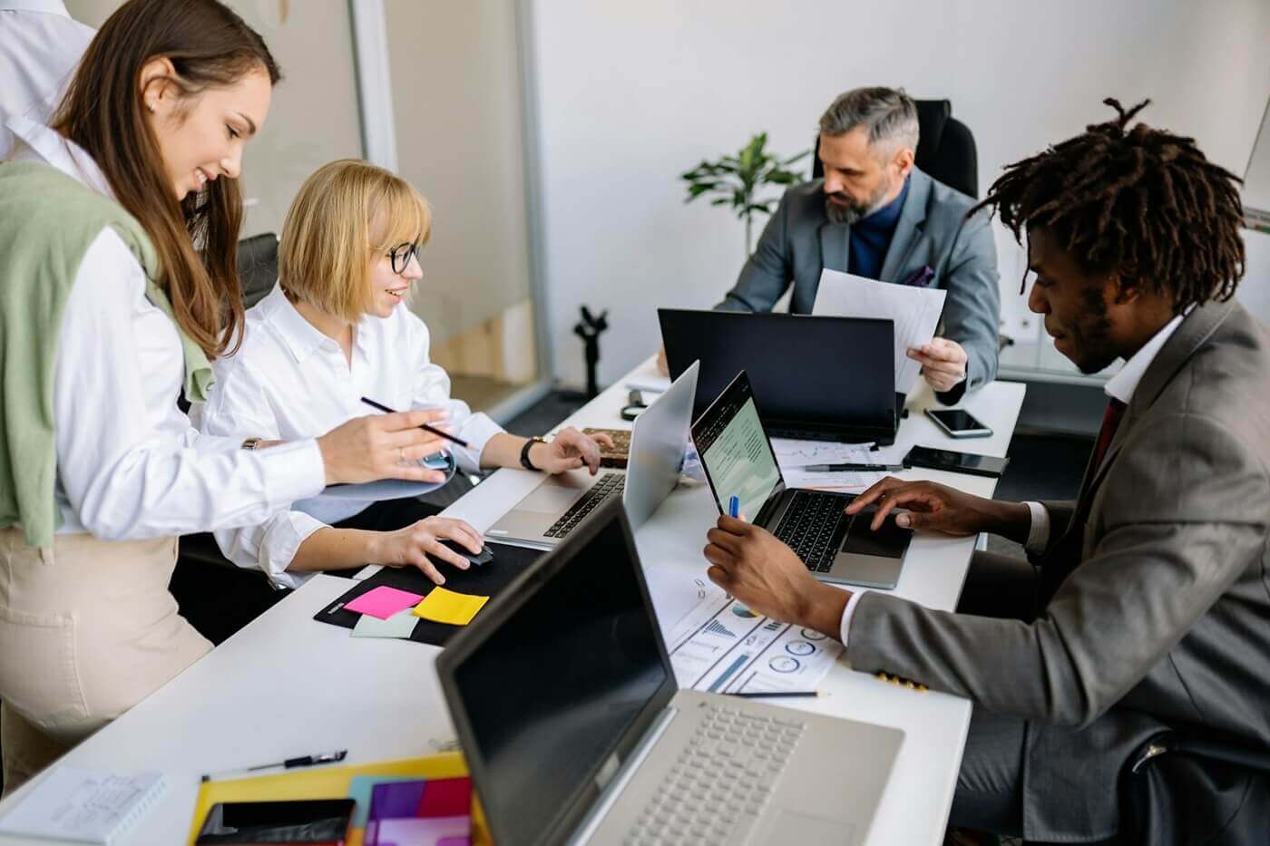 Diverse group of coworkers in a business meeting. Concept: change-ready organization.